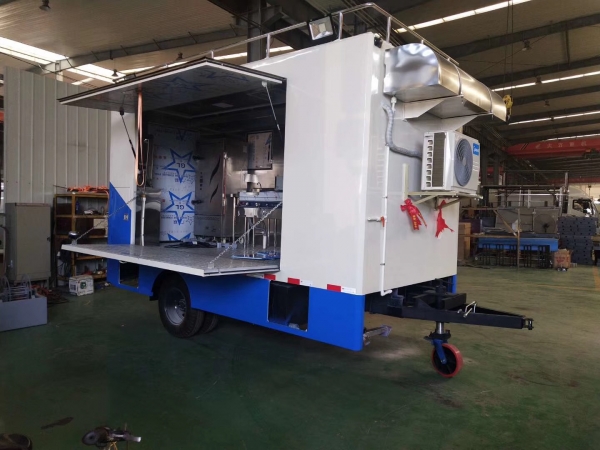 Mobile kitchen trailer customized for outdoor usage